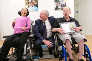 Disability Services Minister Dawson sharing a laugh with Lifeplan clients Kym and Simon